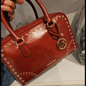 (INTERNAL USE ONLY) LD NOV 17 MK MD THOMPSON DISTRESSED STUDDED SATCHEL CHERRY