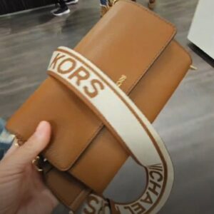 (INTERNAL USE ONLY) LD NOV 25 MK JST LEATHER XBODY BAG PL LUGGAGE