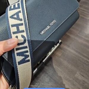 (INTERNAL USE ONLY) LD NOV 25 MK JST LEATHER XBODY BAG NAVY