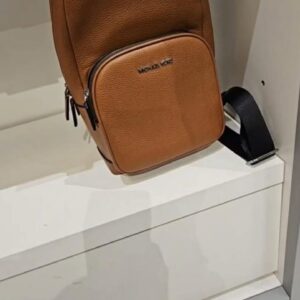 (INTERNAL USE ONLY) LD NOV 24 MK MEN’S SLING PACK PL BROWN