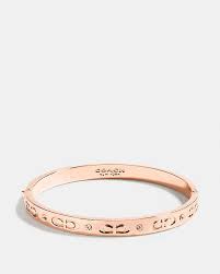 (INTERNAL USE ONLY) LD NOV 23 COACH SIGN HINGED BANGLE ROSEGOLD [CX686]